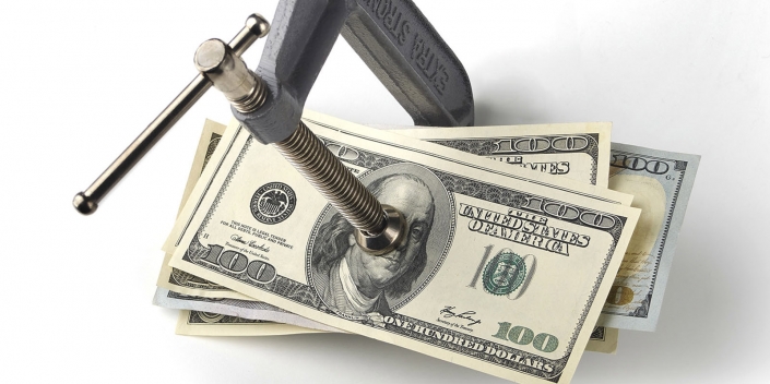 clamp squeezing money